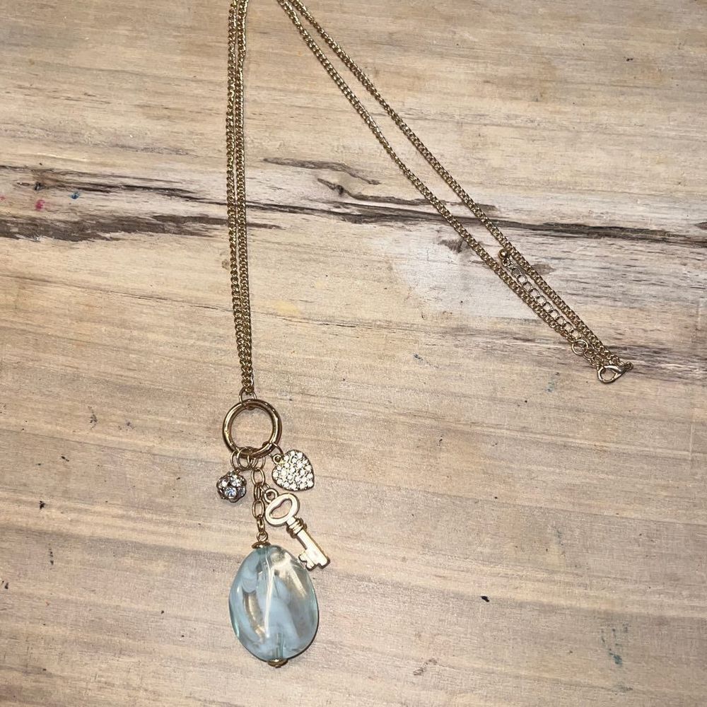 Chemistry Of Love Gold Tone Blue Stone Necklace